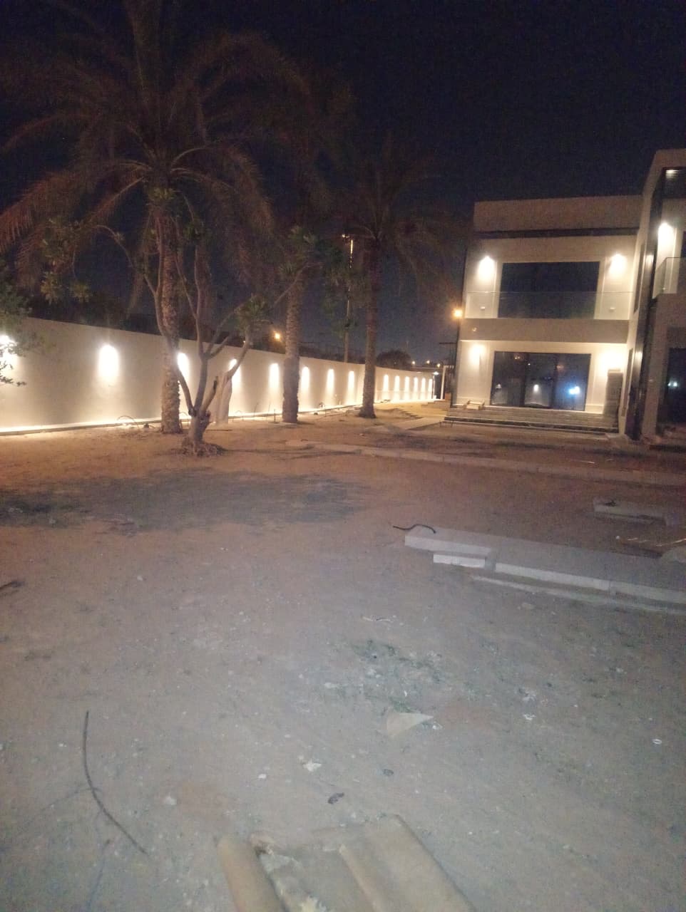 Exterior perimeter wall lighting at night