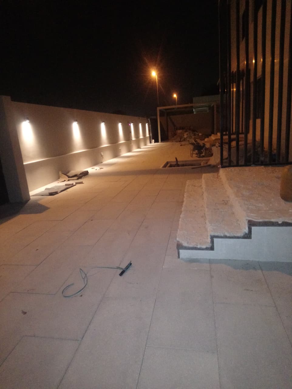 Finished lounge lighting and shelving installation